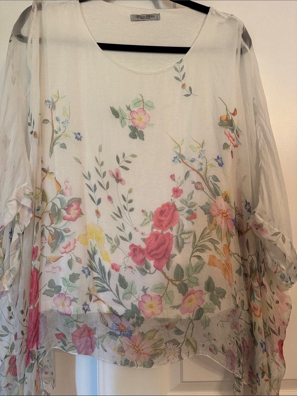Elena Baldi silk White Top with white under shirt.